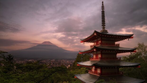 Traditional pagoda and Mount Fuji scenic view at sunset with Asia nature
