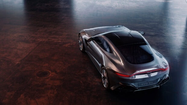 A sleek Aston Martin car captured from the rear in a high resolution setting