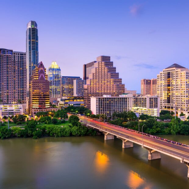 The Austin skyline view with the river and city buildings at dusk without wallpaper or background