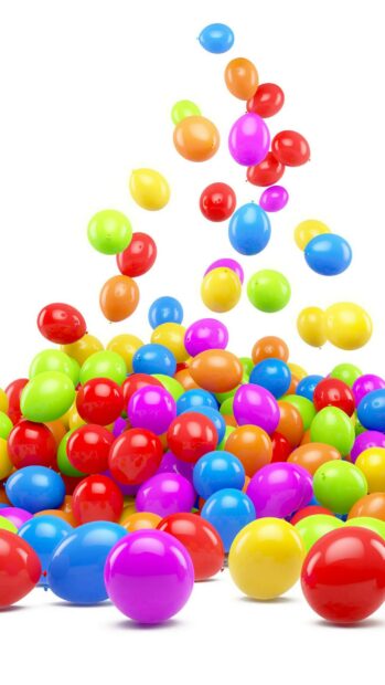 Colorful balloons floating and piled up in a vibrant arrangement