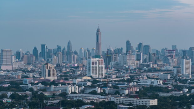 A clear view of the Bangkok skyline with high rise buildings and skyscrapers in the cityscape