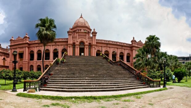 The historic pink architectural building with steps in Bangladesh