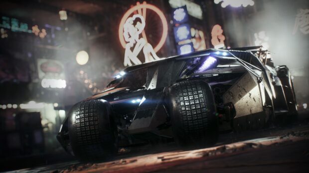 A detailed view of the Batmobile in a dark city showing its rugged design and powerful tires