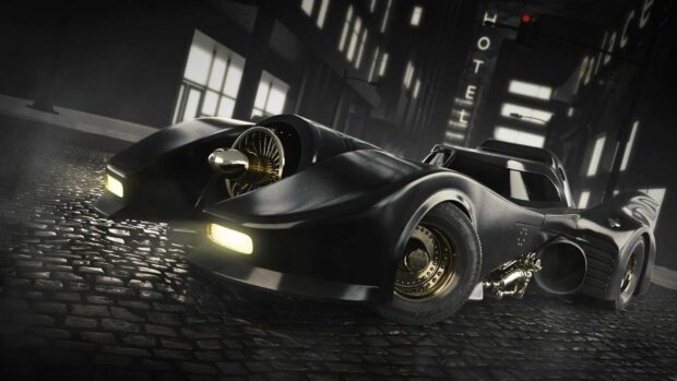 A sleek Batmobile driving on a wet cobblestone street in a dark cityscape at night