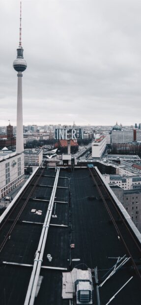 A view of Berlin skyline featuring the Berlin TV tower and surrounding cityscape