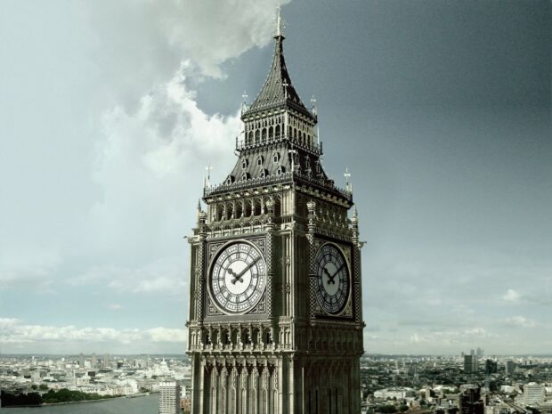 Big Ben clock tower is standing tall over the London cityscape during daytime