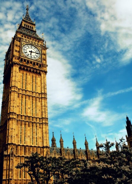 Big Ben clock tower with clear blue sky and historic architecture in London