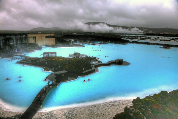 Geothermal water at Blue Lagoon Iceland with volcanic landscape in the background