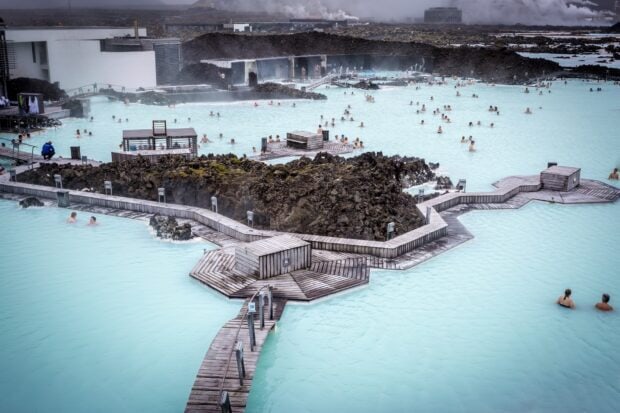 People enjoying natural geothermal water at Blue Lagoon Iceland