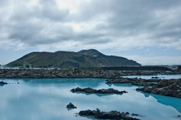 Calm volcanic landscape and blue lagoon water at Blue Lagoon Iceland