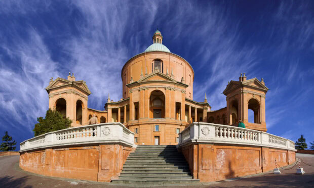 Historic landmark of Bologna with grand staircase and blue sky