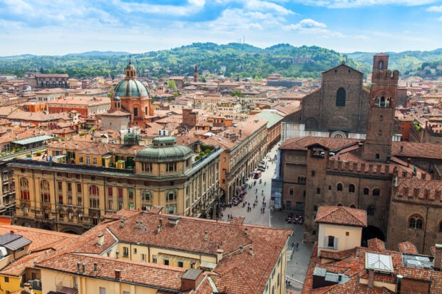 A detailed view of Bologna cityscape showcasing historic architecture and rooftops