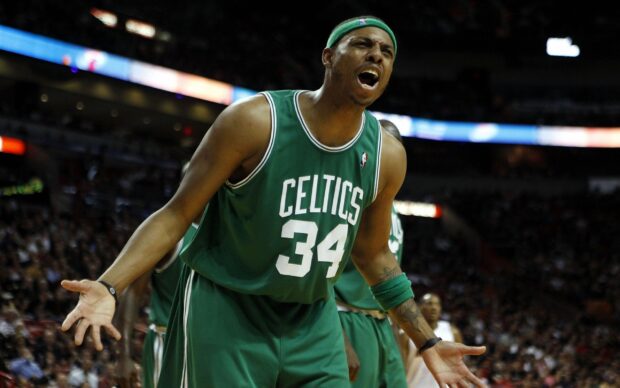 Boston Celtics player wearing number 34 jersey reacting loudly during basketball game