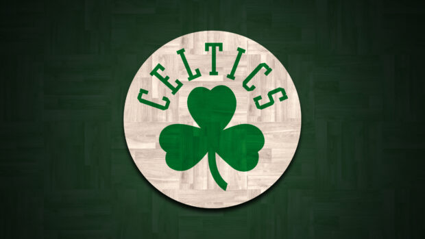 The Boston Celtics logo with a green shamrock on a wooden floor background