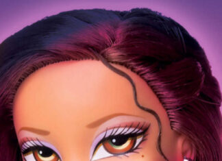 Close up of a Bratz doll with purple hair and pink outfit on a purple background
