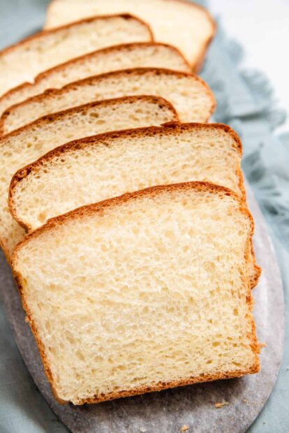 Bread Wallpaper HD Mobile Soft bread slices arranged on a gray surface