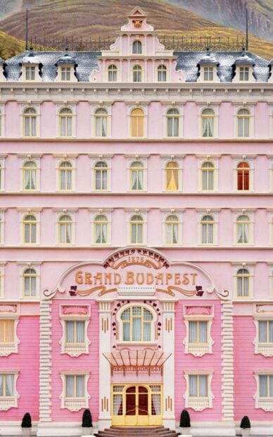 The grand Budapest building with pink walls and multiple windows in Budapest