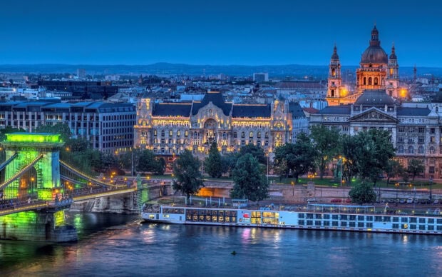 Budapest cityscape at dusk featuring historic architecture and the Danube River