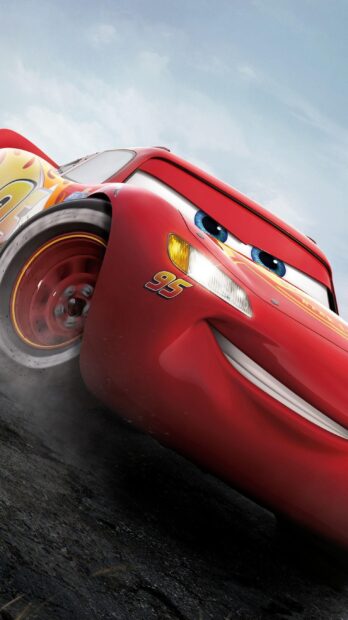 Red animated car from Cars Disney with number 95 speeding on the road