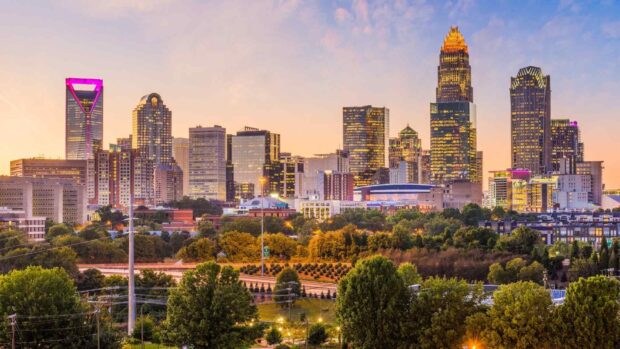 Charlotte downtown skyline with illuminated buildings at dusk