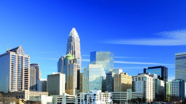Charlotte skyline with modern skyscrapers under clear blue sky