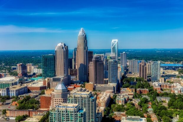 Charlotte skyline with tall buildings and clear blue sky in a vibrant cityscape