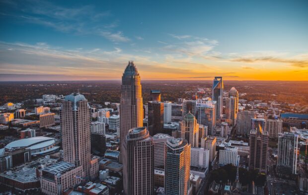 Charlotte skyline view with high rise buildings and sunset sky in HD quality