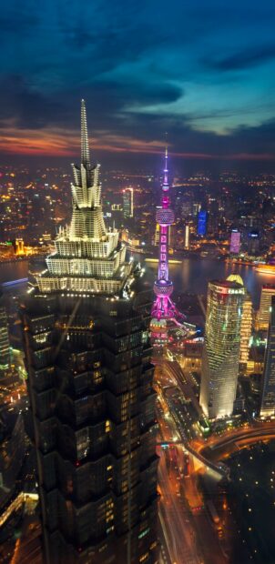 Night view of China cityscape with illuminated skyscrapers and vibrant skyline