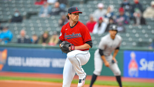 Cleveland Guardians player pitching during a baseball game at the stadium