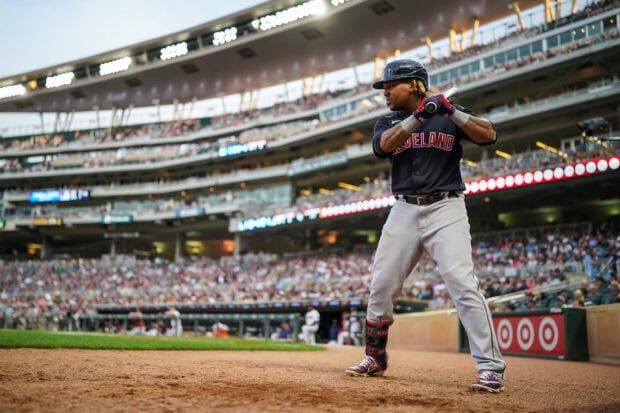 Cleveland Guardians player preparing to bat at the stadium during a baseball game