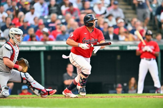 Cleveland Guardians player running to first base during a baseball game at the stadium