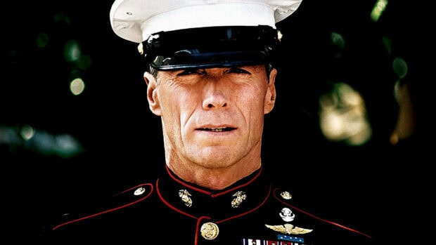 Clint Eastwood wearing a marine uniform with medals in a close up portrait