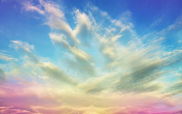 Beautiful clouds spread across the blue sky in a stunning natural scene