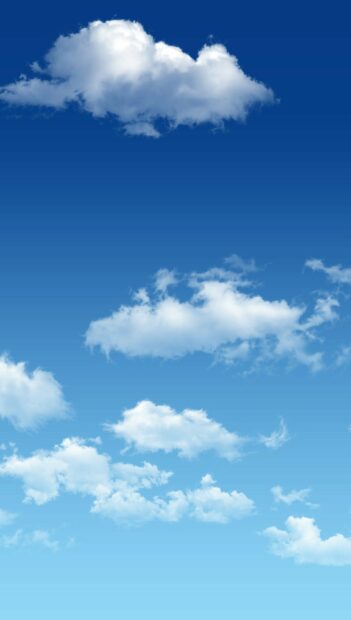 Fluffy clouds spread across a clear blue sky with varying shapes and sizes