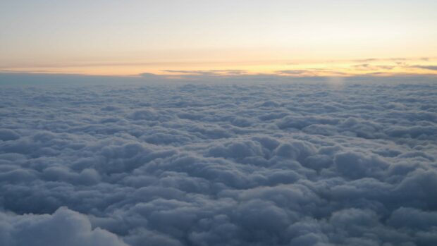 A vast expanse of clouds captured during sunset showing detailed clouds texture