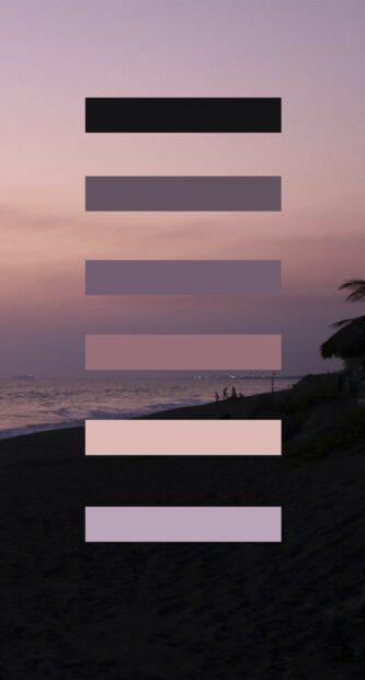 A serene color palette featuring purple and pink hues over a calm beach at sunset