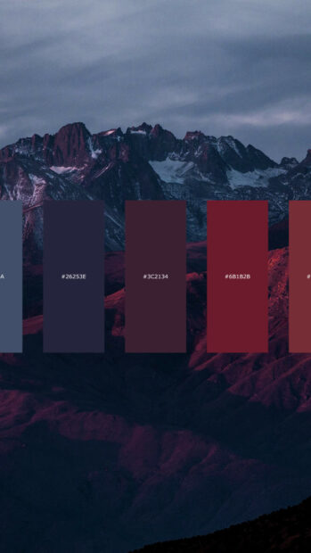Dark mountain landscape with color palette bars featuring deep red and blue shades