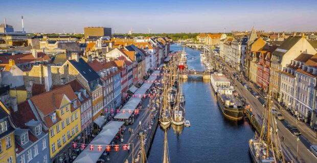Copenhagen cityscape with colorful historic buildings along the canal in the city center