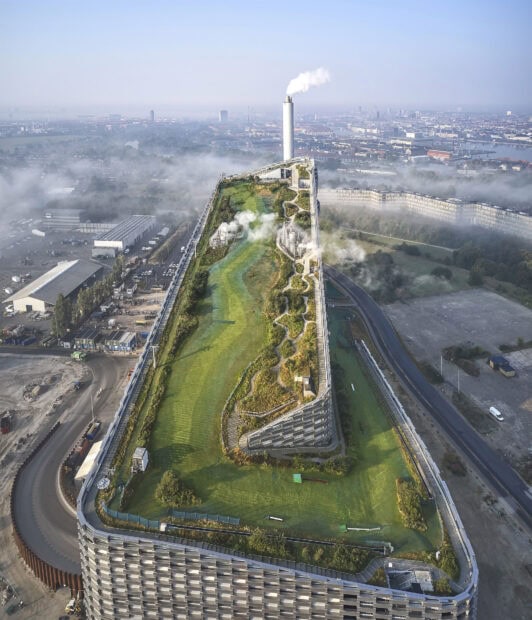 Aerial view of Oslo waste to energy plant with green roof and golf course in Copenhagen