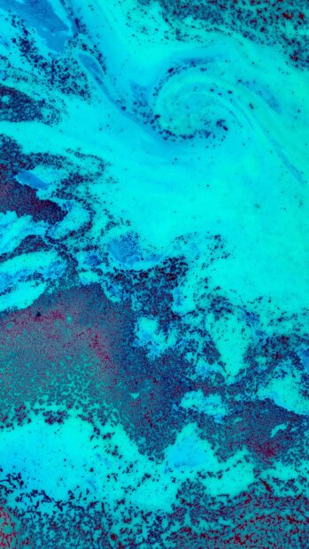 Vibrant coral sea pattern with swirling blue and dark red textures in high detail