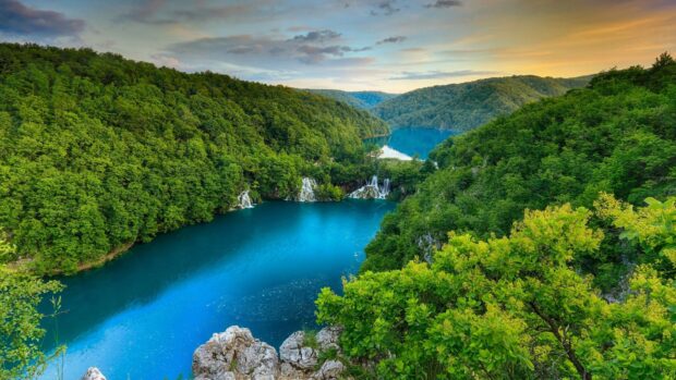 Lush green forests surrounding a pristine blue lake in Croatia nature