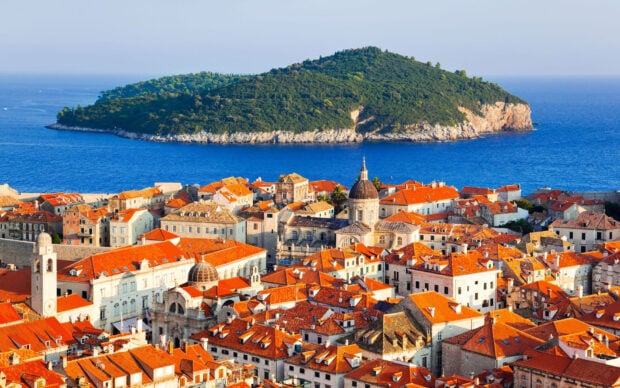 Historic city architecture with Croatia island in the background
