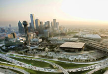 Dallas city skyline with skyscrapers and busy highways in Texas