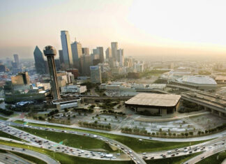 Dallas city skyline with skyscrapers and busy highways in Texas