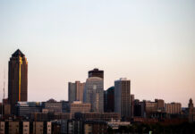 Des Moines skyline at sunset showcasing various tall buildings and urban architecture