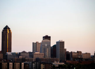 Des Moines skyline at sunset showcasing various tall buildings and urban architecture
