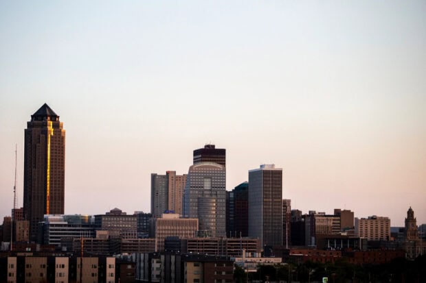 Des Moines skyline at sunset showcasing various tall buildings and urban architecture