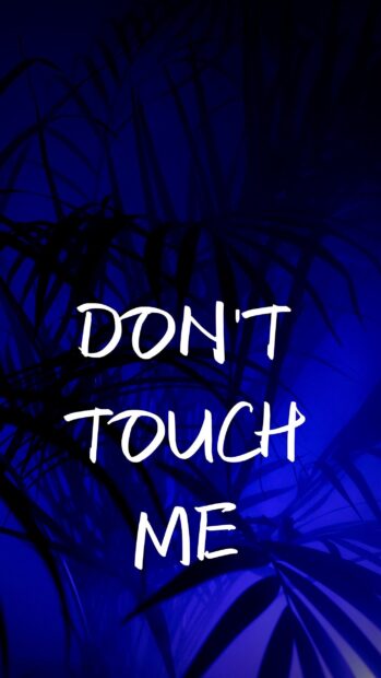 Dont Touch phrase on dark blue leaves silhouette with dont touch phrase