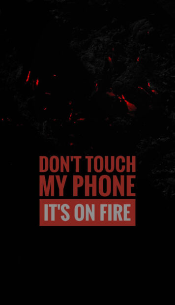 Dont touch my phone phrase with fire effect on dark background