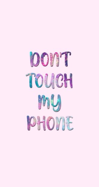 Colorful galaxy styled text saying dont touch my phone on light pink background